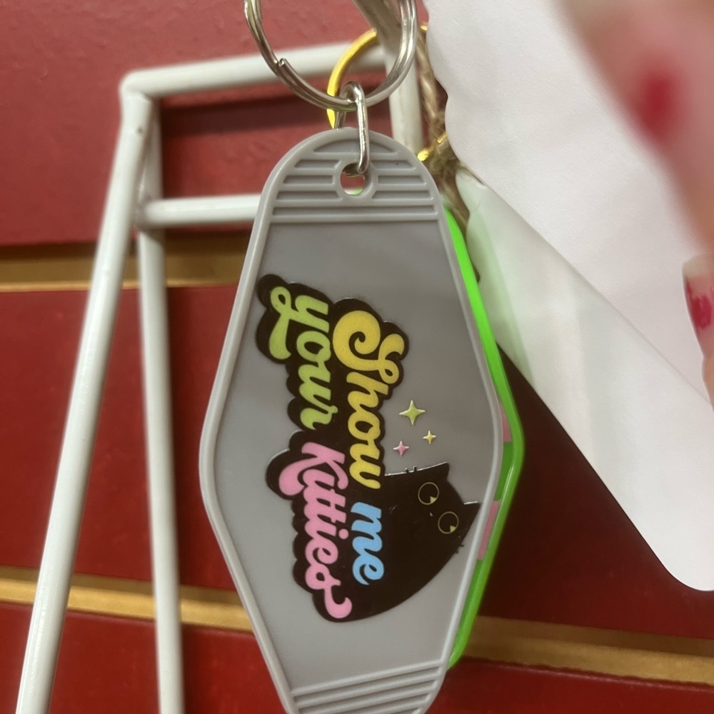 Gray Keychain with Cat Design